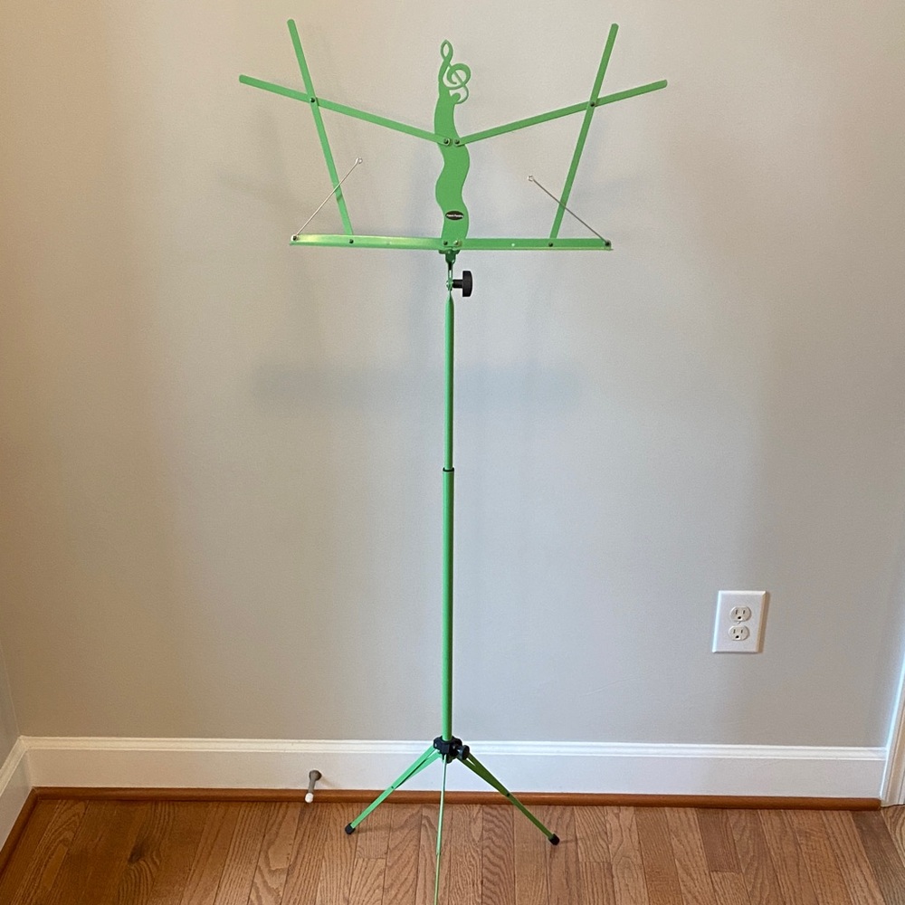 Primo music stand in a green color.portable, lightweight folding music stand.